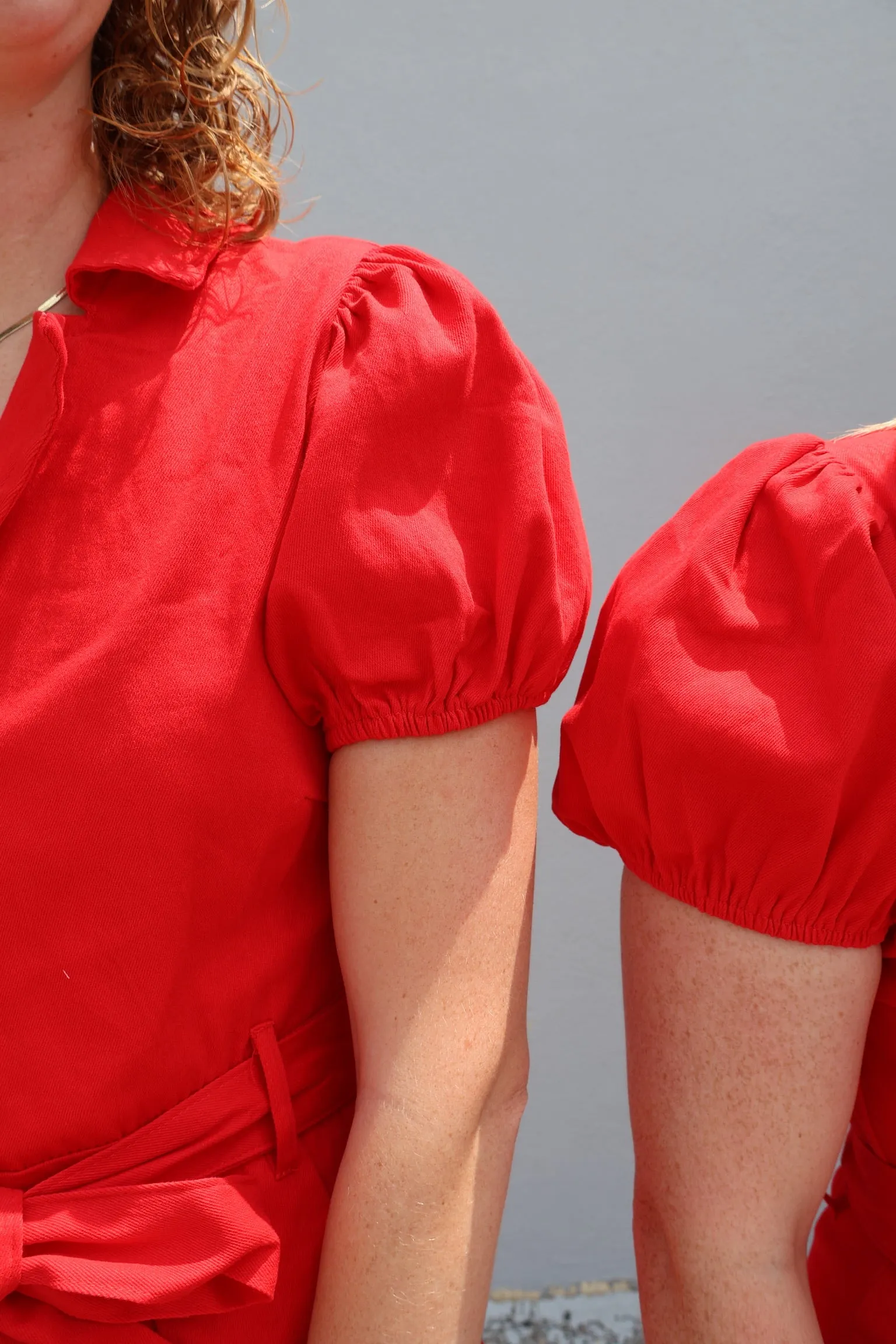 Daisy red denim romper zipdown with puff sleeves